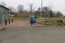 Welcome sign and toilets