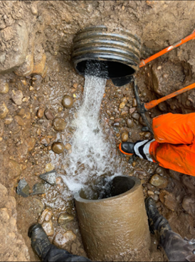 Image of repairs ongoing on damaged pipework in Dunkeld in April 2024